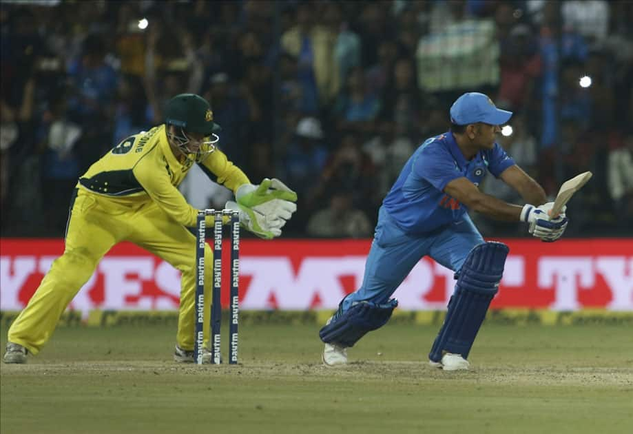 India's MS Dhoni in action during the third ODI cricket match between India and Australia at Holkar Cricket Stadium in Indore