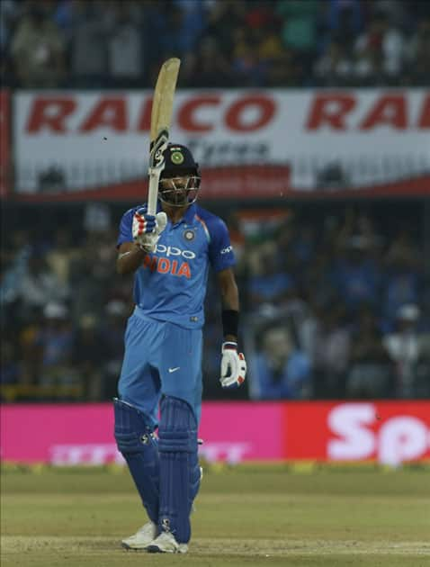 India's Hardik Pandya celebrates his half century during the third ODI cricket match between India and Australia at Holkar Cricket Stadium in Indore.