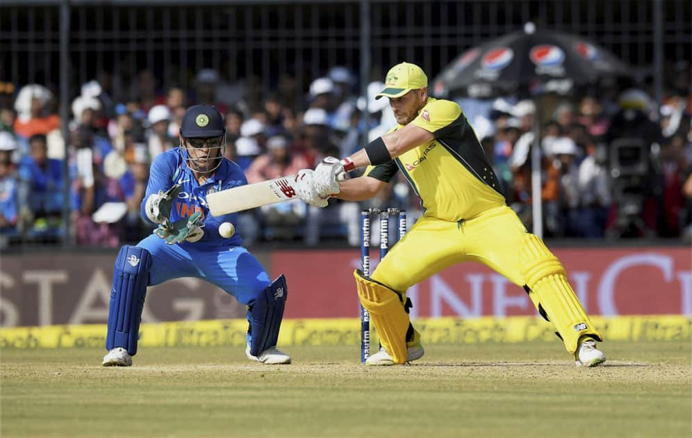 Australian batsman AJ Finch plays a shot during the 3rd ODI cricket match against India at Holkar Stadium in Indore