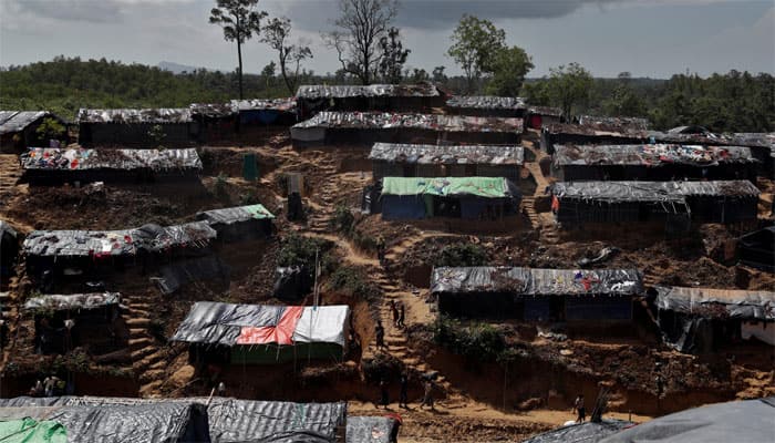 Myanmar looks for more Hindu corpses as mass grave unearthed