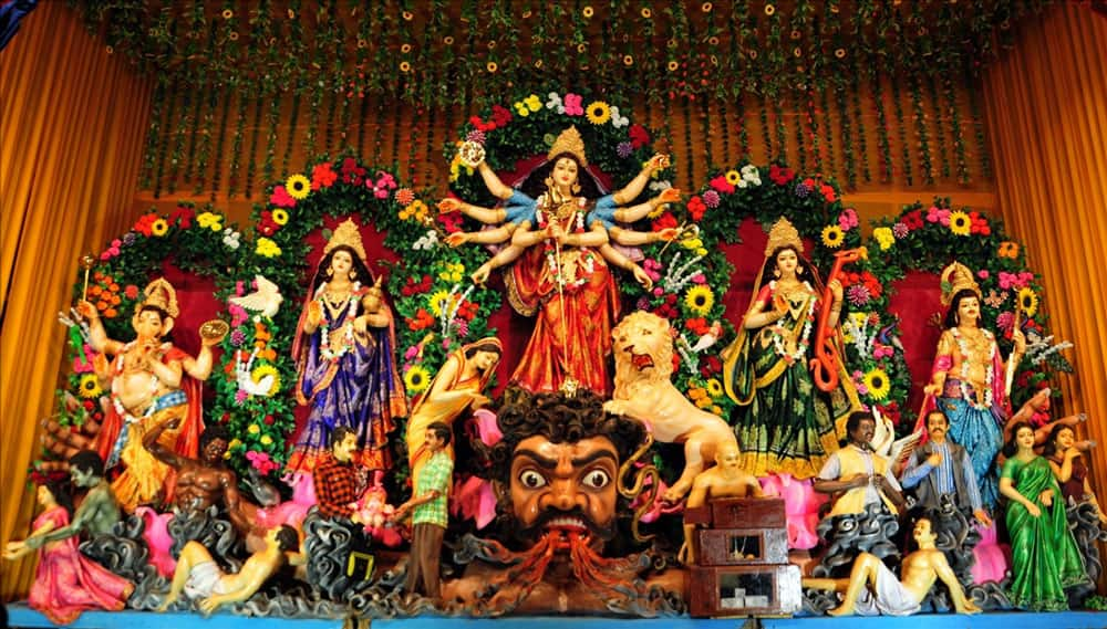 People throng the Durga pandal at Md. Ali Park in Kolkata.