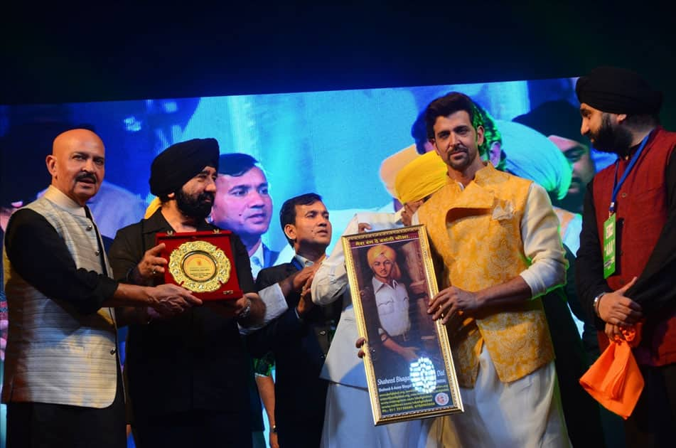 Actors Hrithik Roshan and Rakesh Roshan during the celebration of Basanti Chola Diwas - 100th Birth Anniversary Of Bhagat Singh in Mumbai.