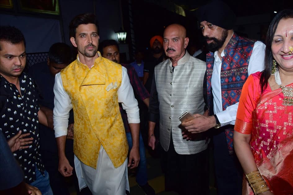 Actors Hrithik Roshan and Rakesh Roshan during the celebration of Basanti Chola Diwas - 100th Birth Anniversary Of Bhagat Singh in Mumbai.