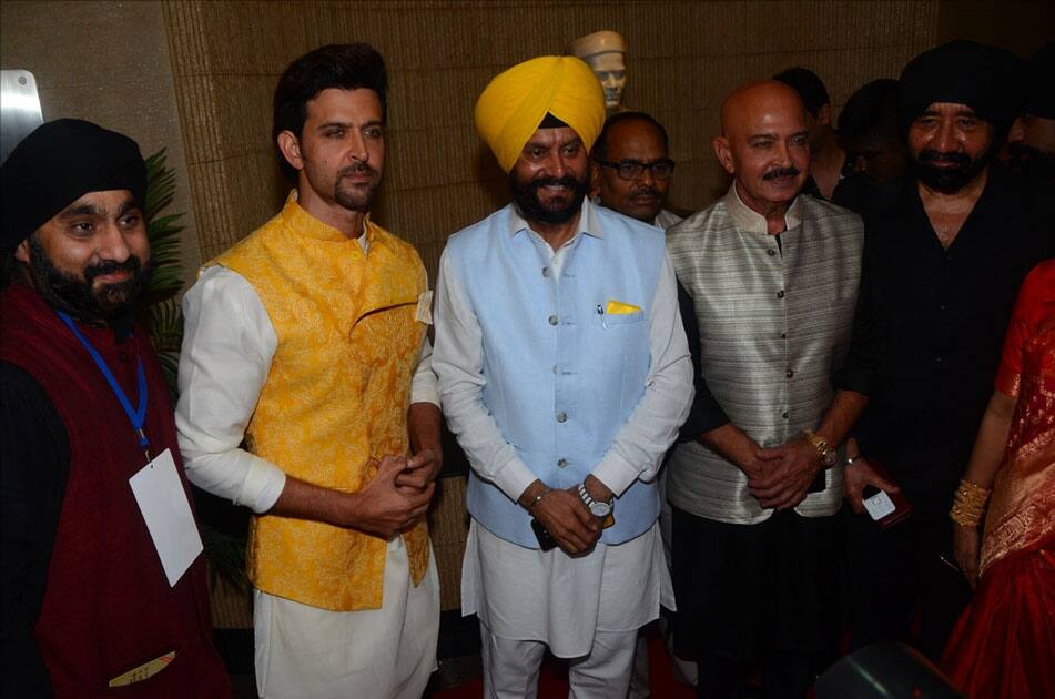 Actors Hrithik Roshan and Rakesh Roshan during the celebration of Basanti Chola Diwas - 100th Birth Anniversary Of Bhagat Singh in Mumbai.