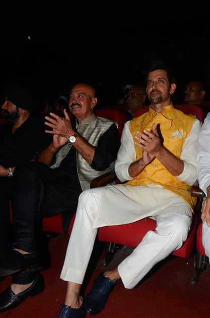 Actors Hrithik Roshan and Rakesh Roshan during the celebration of Basanti Chola Diwas - 100th Birth Anniversary Of Bhagat Singh in Mumbai.