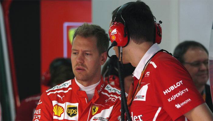 Ferrari&#039;s Sebastian Vettel leads Kimi Raikkonen in Malaysian GP practice two