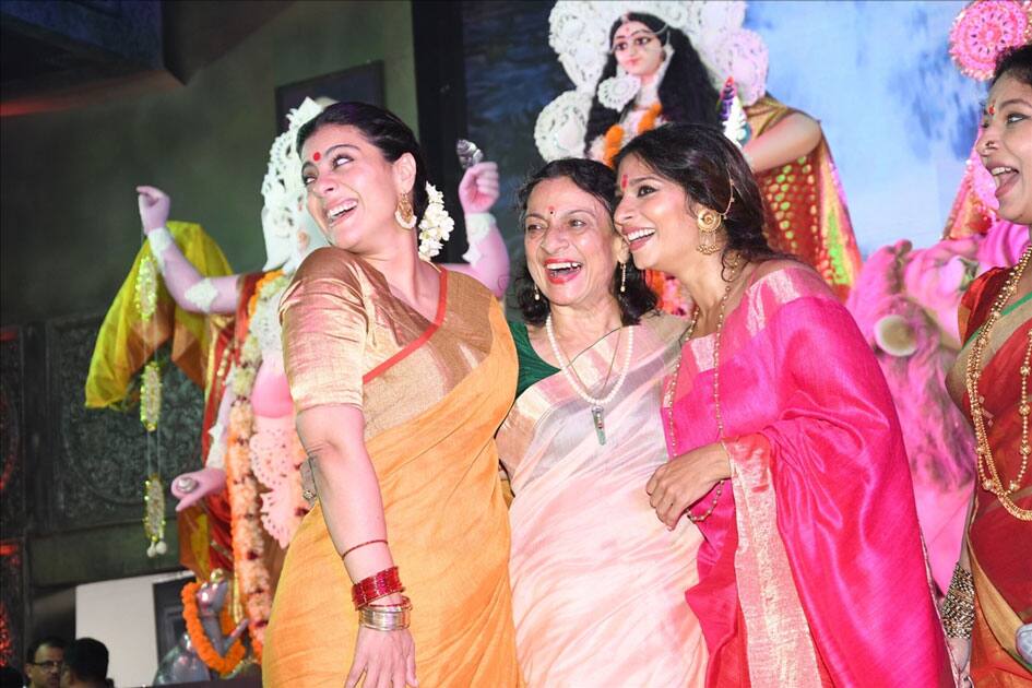 Actresses Kajol, Tanuja Mukherjee and Tanisha Mukherjee during the celebration of Durga Ashtami in Mumbai.