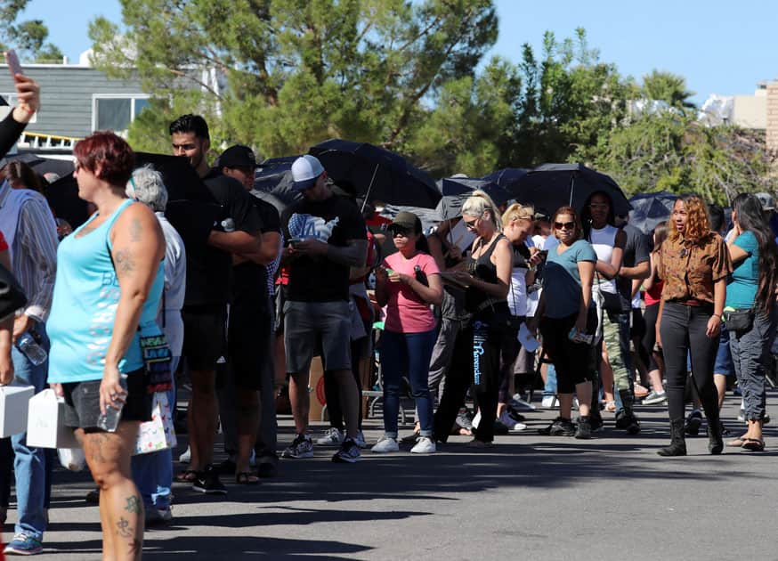 Hundreds of people queue to donate blood following the mass shooting at the Route 91 music festival in Las Vegas.