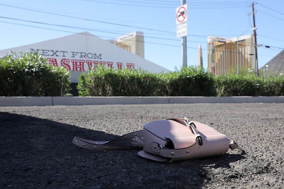 A handbag is seen on the street next to the site of the Route 91 music festival mass shooting outside the Mandalay Bay Resort and Casino in Las Vegas.