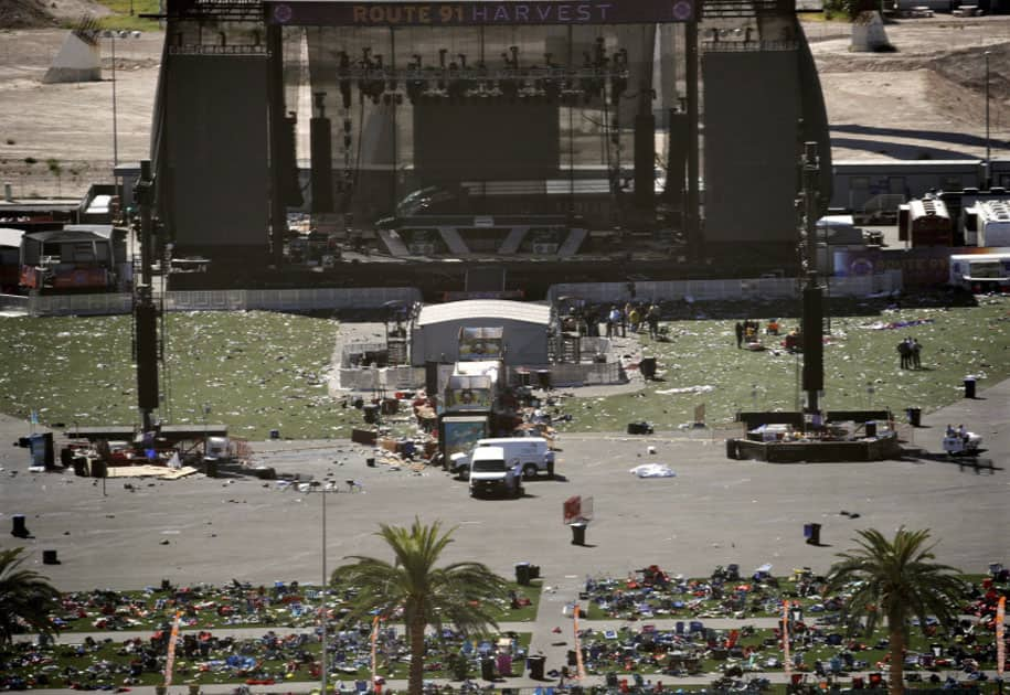 Debris is strewn through the scene of a mass shooting at a music festival near the Mandalay Bay resort and casino in Las Vegas.