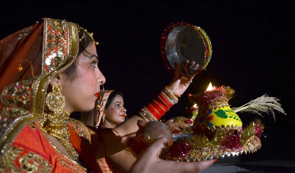 Women celebrate Karva Chauth in Lucknow.