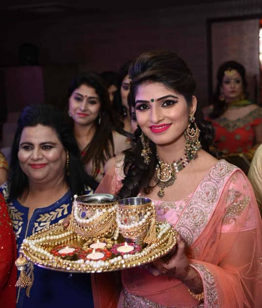 Women during a fashion show organised on Karva Chauth in Amritsar.