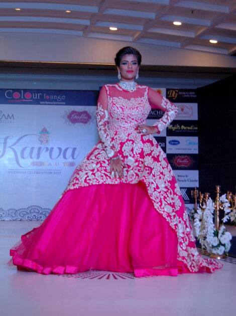 A woman walks the ramp during a fashion show organized on Karva Chauth in Amritsar.