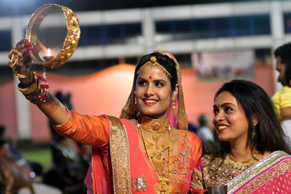 Women celebrate Karva Chauth in Jaipur.