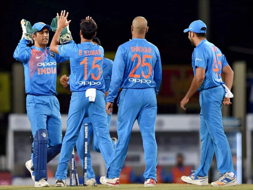 Indian bowler B.Kumar celebrates with his teammates after dismissing Australian batsman D.Warner during the 1st T20 cricket match between India and Australia in Ranchi.