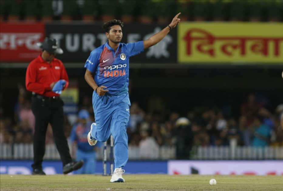 Kuldeep Yadav of India celebrates fall of Aron Finch's wicket during the first T20 match between India and Australia at JSCA International Stadium in Ranchi.