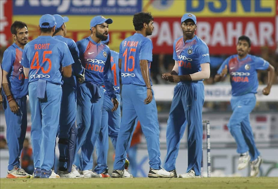 Bhuvneshwar Kumar of India celebrates fall of Aaron Finch''s wicket during the second T20 match between India and Australia at Barsapara Cricket Stadium in Guwahati.