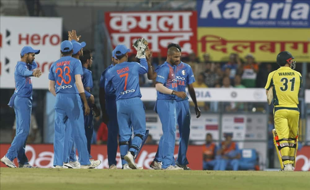 Indian captain Virat Kohli celebrates fall of David Warner''s wicket during the second T20 match between India and Australia at Barsapara Cricket Stadium in Guwahati.