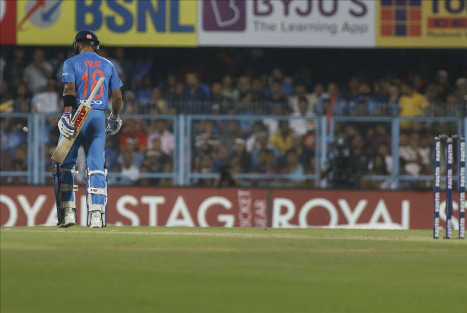 Indian captain Virat Kohli returns back to the pavilion after getting dismissed during the second T20 match between India and Australia at Barsapara Cricket Stadium in Guwahati.