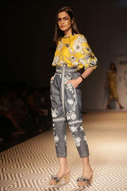 Models walk the ramp showcasing the creations of fashion designer Vineet Bahl at Amazon India Fashion Week Summer Spring in New Delhi.