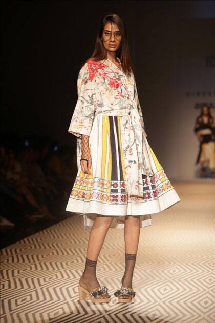 Models walk the ramp showcasing the creations of fashion designer Vineet Bahl at Amazon India Fashion Week Summer Spring in New Delhi.