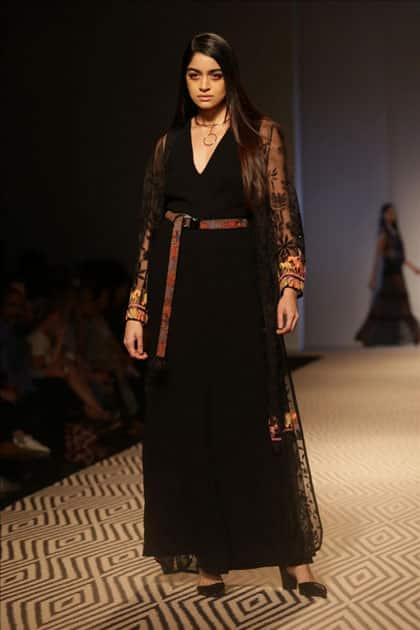 Models walk the ramp showcasing the creations of fashion designer PATINE at Amazon India Fashion Week Summer Spring, in New Delhi.