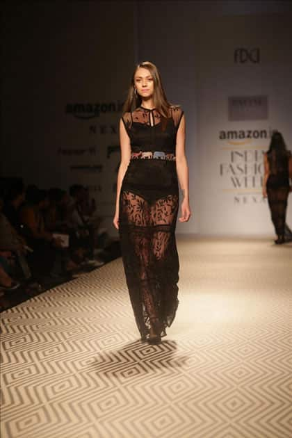 Models walk the ramp showcasing the creations of fashion designer PATINE at Amazon India Fashion Week Summer Spring, in New Delhi.