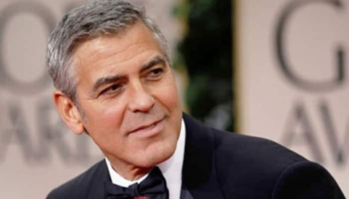 They&#039;re born with personalities: George Clooney on his twins