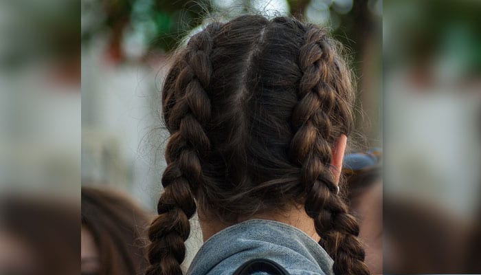 Japanese girl sues government after school forces her to dye her hair black