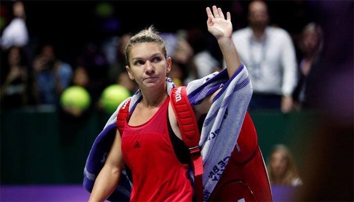 WTA Finals: Top-ranked Simona Halep crashes out, Caroline Garcia stuns Caroline Wozniacki to reach last four
