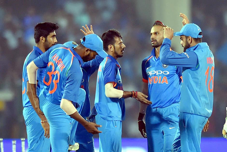 India's Yuzvendra Chahal celebrates the wicket of New Zealand batsman Colin Munro during 3rd ODI cricket match against India at Green Park Stadium in Kanpur.