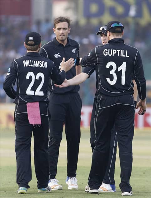 Tim Southee of New Zealand celebrates fall of Virat Kohli's wicket during the third ODI match between India and New Zealand at Green Park Stadium in Kanpur.