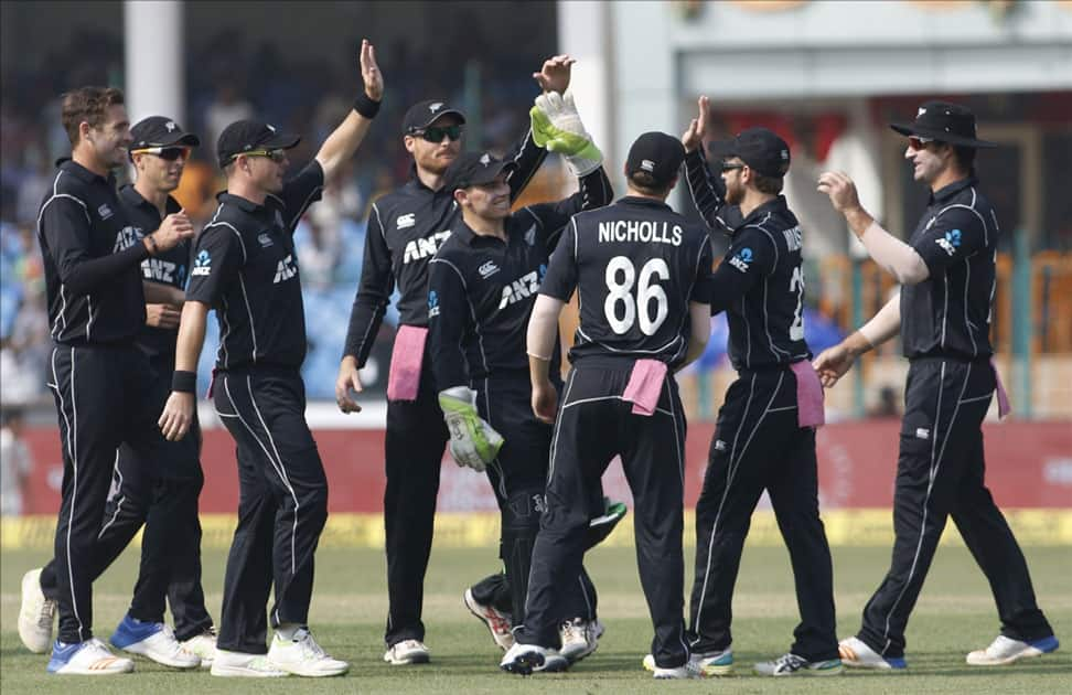 Tim Southee of New Zealand celebrates fall of Shikhar Dhawan's wicket during the third ODI match between India and New Zealand at Green Park Stadium in Kanpur.