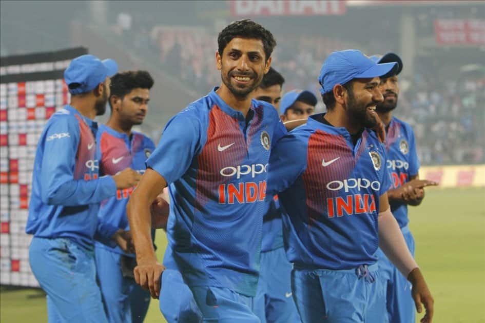 India's Ashish Nehra along with teammates celebrates after the end of the first T20 match between India and New Zealand at Feroz Shah Kotla stadium in New Delhi.