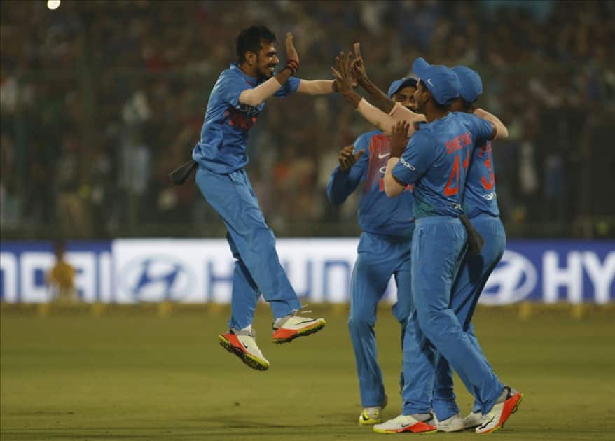 Yuzvendra Chahal of India celebrates fall of Martin Guptill's wicket during the first T20 match between India and New Zealand at Feroz Shah Kotla stadium in New Delhi.