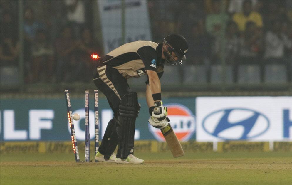 Colin Munro of New Zealand gets dismissed during the first T20 match between India and New Zealand at Feroz Shah Kotla stadium in New Delhi.