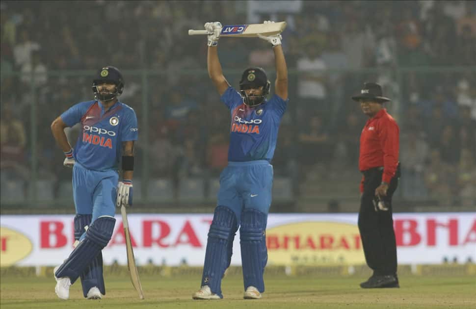 Virat Kohli and Rohit Sharma of India during the first T20 match between India and New Zealand at Feroz Shah Kotla stadium in New Delhi.