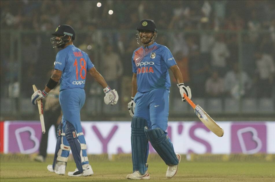 Virat Kohli and MS Dhoni of India during the first T20 match between India and New Zealand at Feroz Shah Kotla stadium in New Delhi.