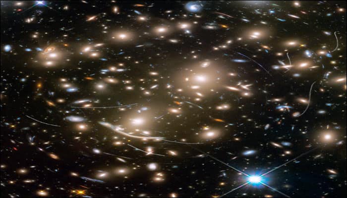 NASA&#039;s Hubble captures distant galaxies as asteroids photobomb them - See pics