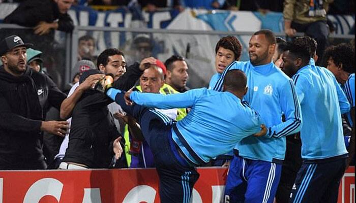 Karate-kick Patrice Evra suspended by Marseille, charged by UEFA