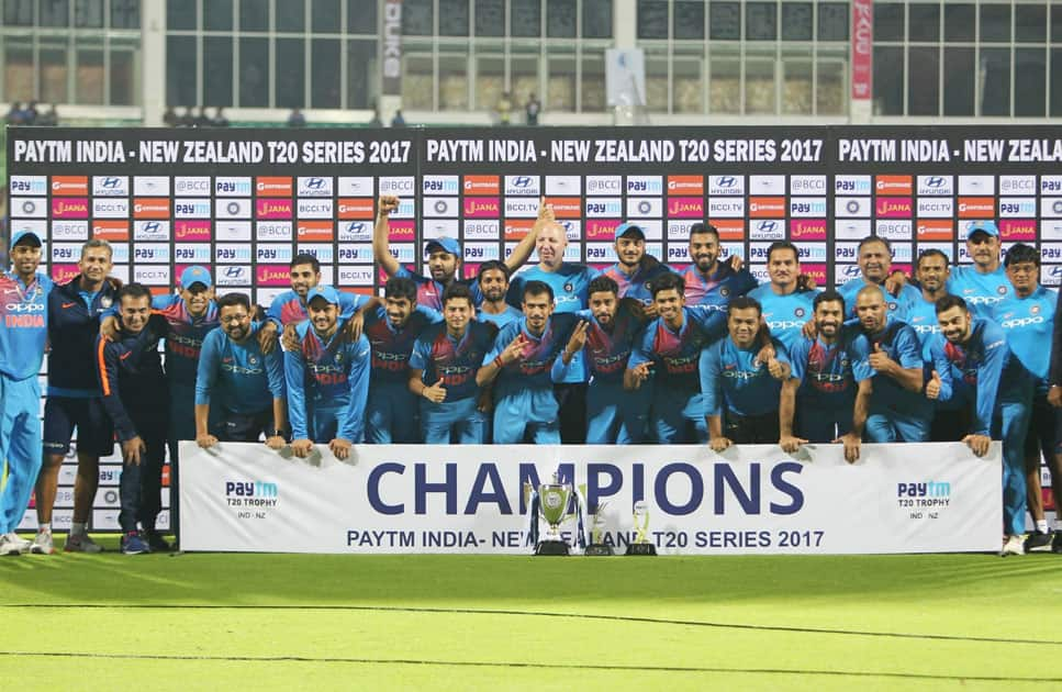 Team India pose with the trophy after winning the T20I series 2-1 during post match presentation ceremony after winning the third and final T20 International match against New Zealand