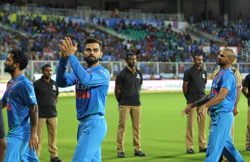 Indian skipper Virat Kohli celebrates after winning the third and final T20 International match against New Zealand