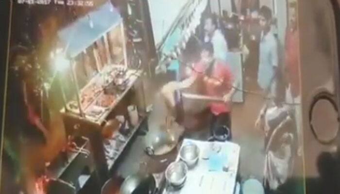 WATCH: Roadside eatery owner throws hot oil on customers who complained of bad service