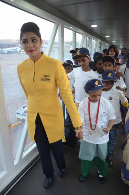 An air hostess with children during 