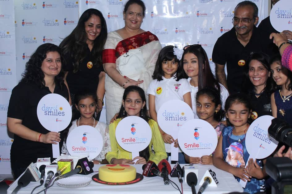 Actress Aishwarya Rai Bachchan along with her mother Brindya Rai, daughter Aaradhya Bachchan and children born with cleft lips and palates of 'Smile Train' celebrates her father Krishnaraj Rai's birth anniversary at Shushrusha Hospital, in Mumbai.