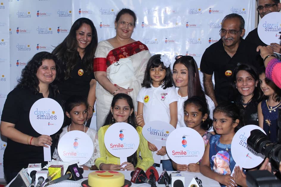 Actress Aishwarya Rai Bachchan along with her mother Brindya Rai, daughter Aaradhya Bachchan and children born with cleft lips and palates of 'Smile Train' celebrates her father Krishnaraj Rai's birth anniversary at Shushrusha Hospital, in Mumbai.