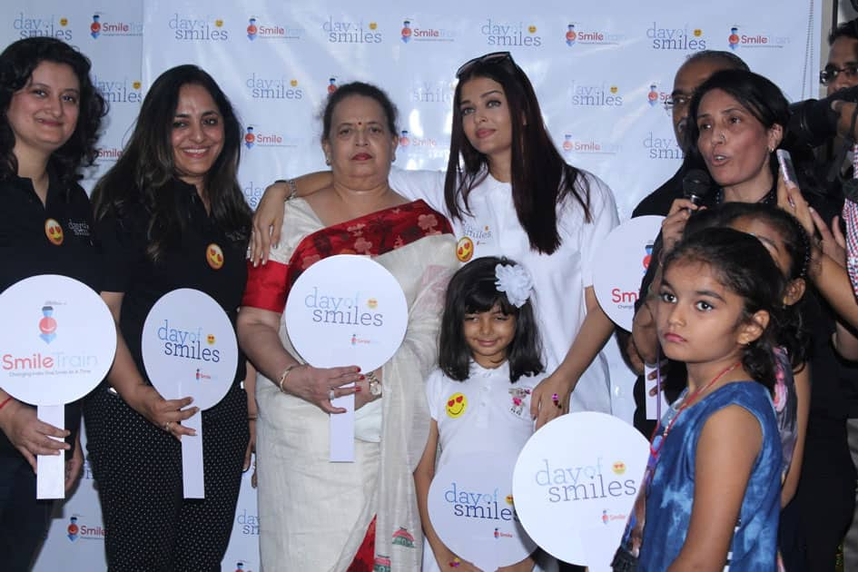 Actress Aishwarya Rai Bachchan along with her mother Brindya Rai, daughter Aaradhya Bachchan and children born with cleft lips and palates of 'Smile Train' celebrates her father Krishnaraj Rai's birth anniversary at Shushrusha Hospital, in Mumbai.