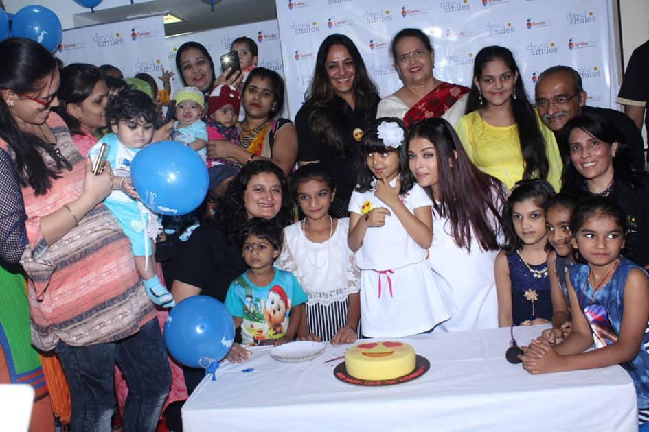 Actress Aishwarya Rai Bachchan along with her mother Brindya Rai, daughter Aaradhya Bachchan and children born with cleft lips and palates of 'Smile Train' celebrates her father Krishnaraj Rai's birth anniversary at Shushrusha Hospital, in Mumbai.