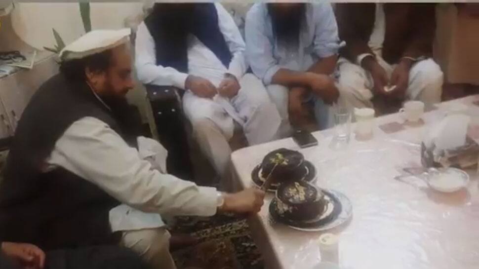 Hafiz Saeed relishes &#039;luscious cake&#039; after release from custody - Watch