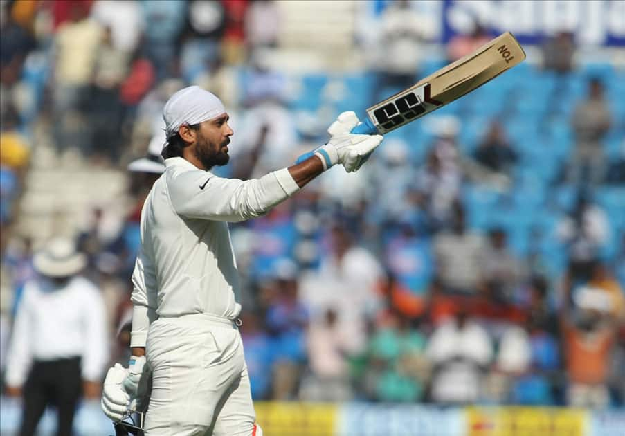 India's Murali Vijay celebrates his century on Day 2 of the second test match between India and Sri Lanka at Vidarbha Cricket Association Stadium in Nagpur.